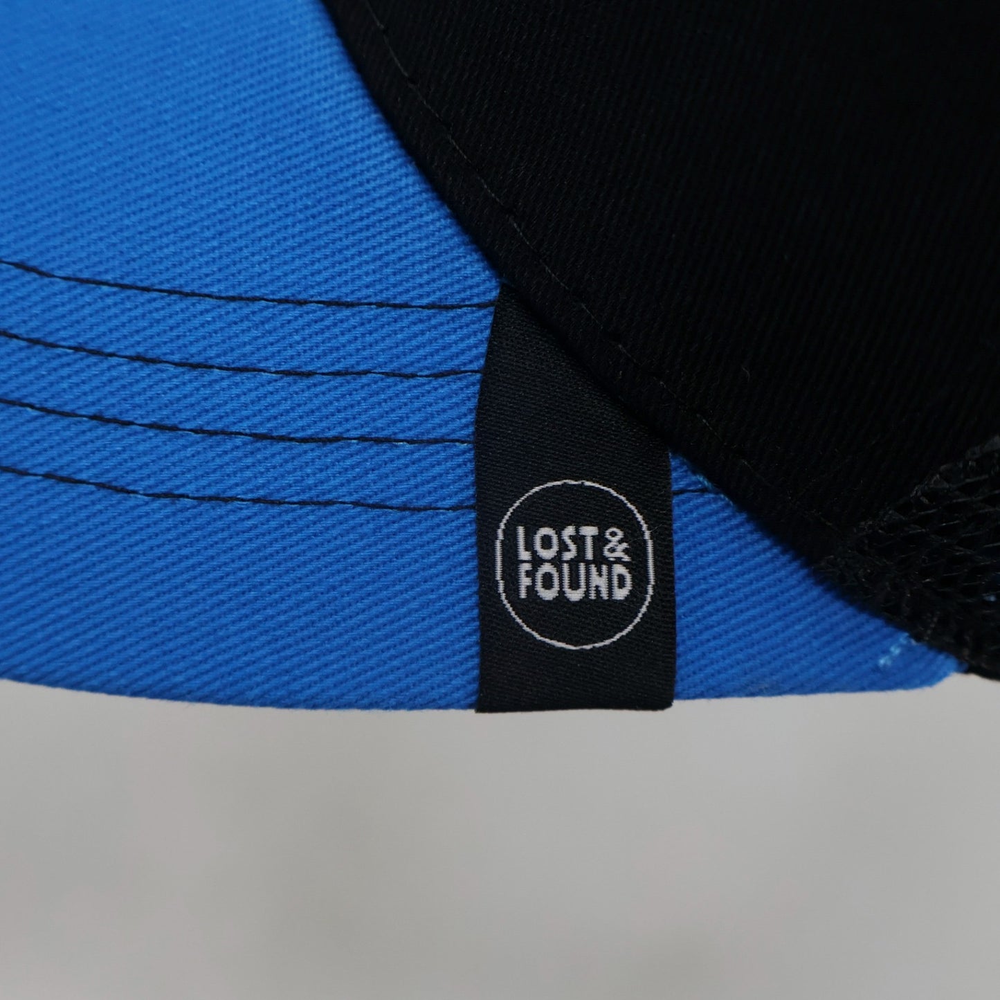 Lost & Found Trucker Cap - Black/Blue