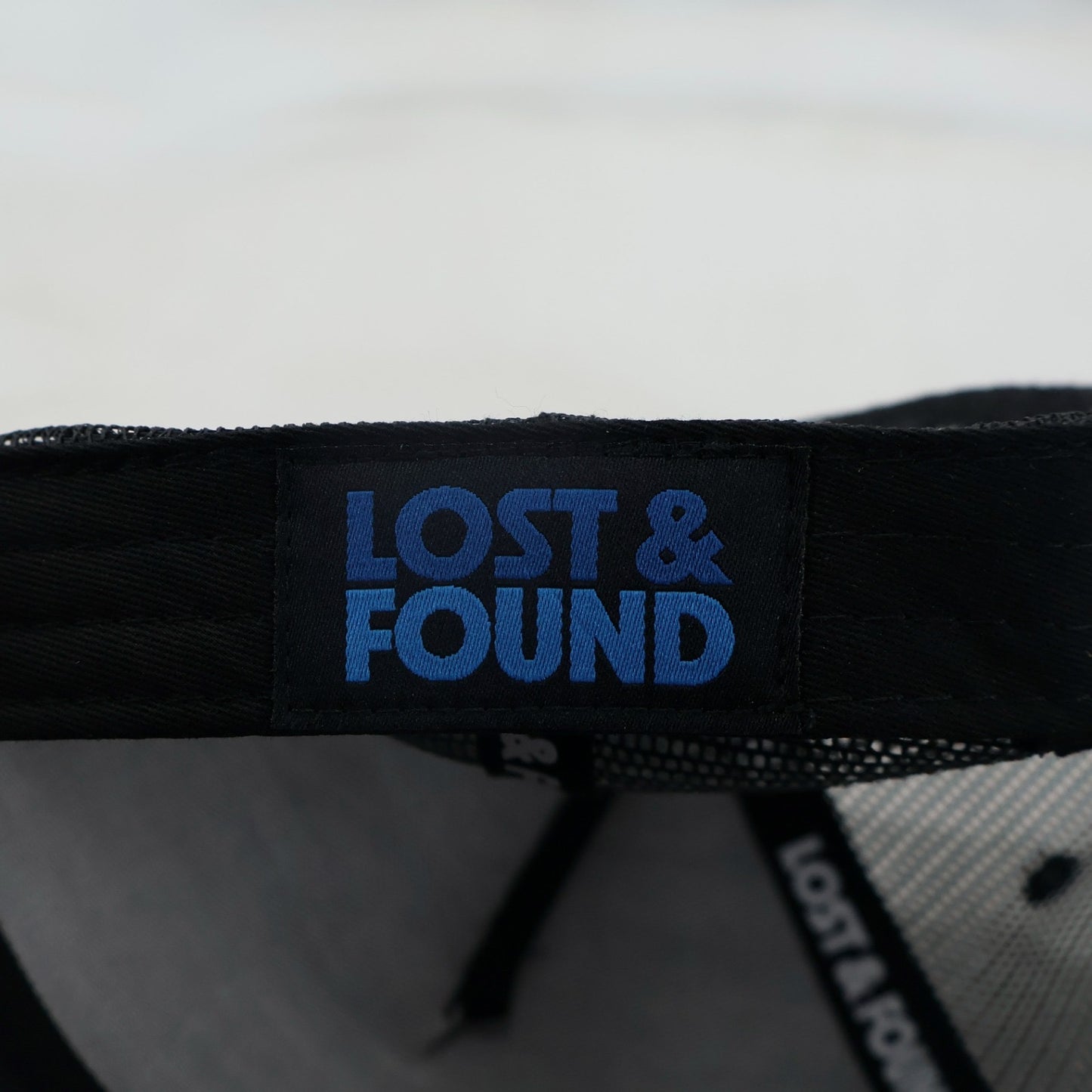 Lost & Found Trucker Cap - Black/Blue